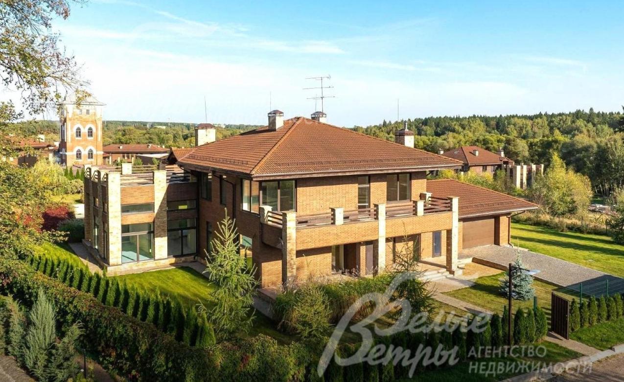 Дом на участке 34 сотки с ландшафтным дизайном в поселке Усадьба Бергов