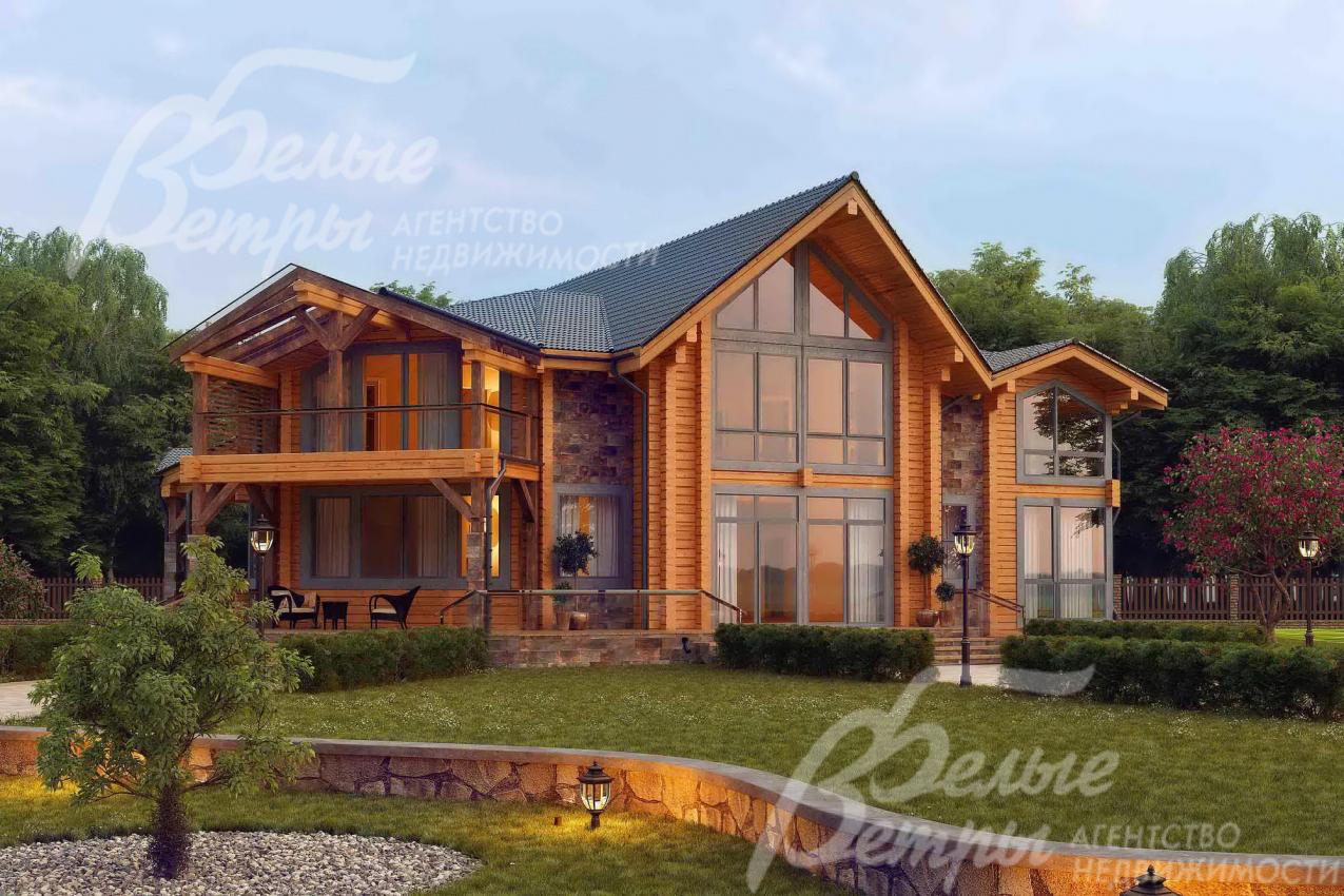 Деревянный дом из клееного бруса в лесу