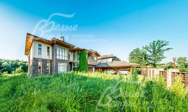 Дом под ключ на участке площадью 40 соток в коттеджном поселке Променад