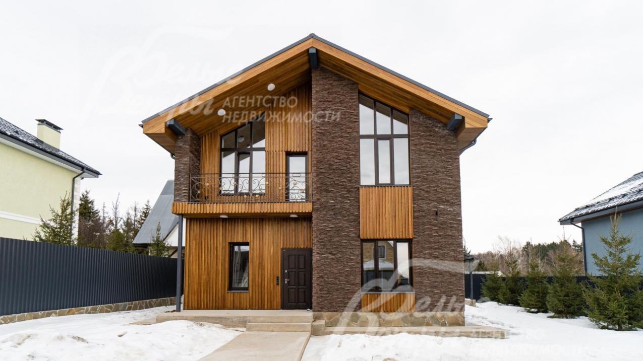 Дом в современном стиле с панорамными окнами