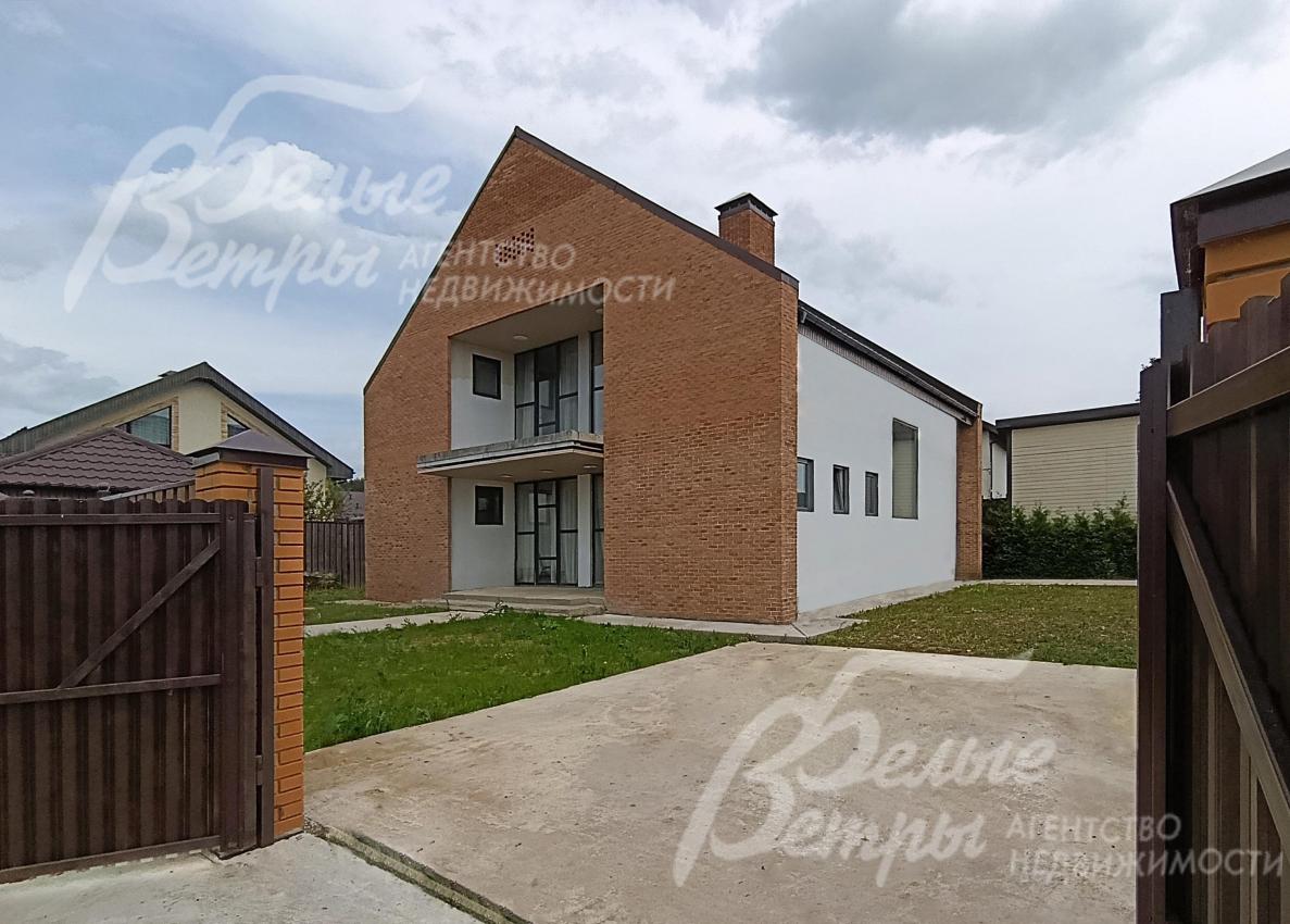 Современный загородный коттедж в архитектурном стиле «БарнХаус»