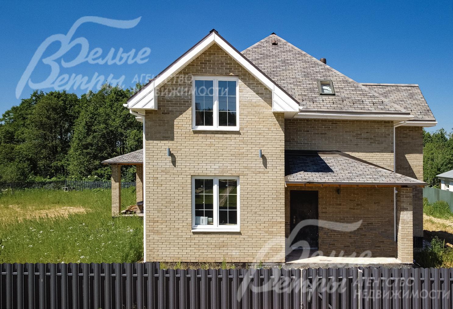 Красивый дом современной архитектуры на участке площадью 15 соток в сформированном коттеджном поселке Изумрудная долина